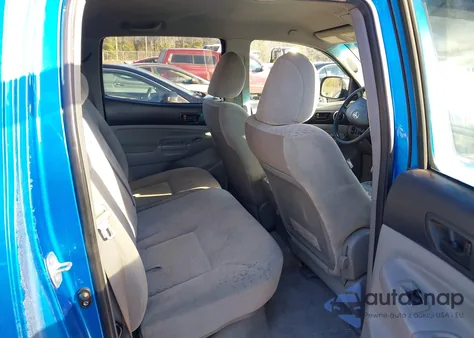 2009 Toyota Tacoma Base V6 z USA, uszkodzony, nr VIN 3TMMU52N69M013521